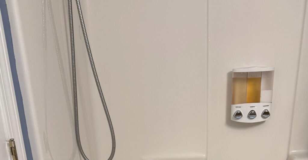 Wall mounted shower soap dispenser makes bathing easier for the elderly