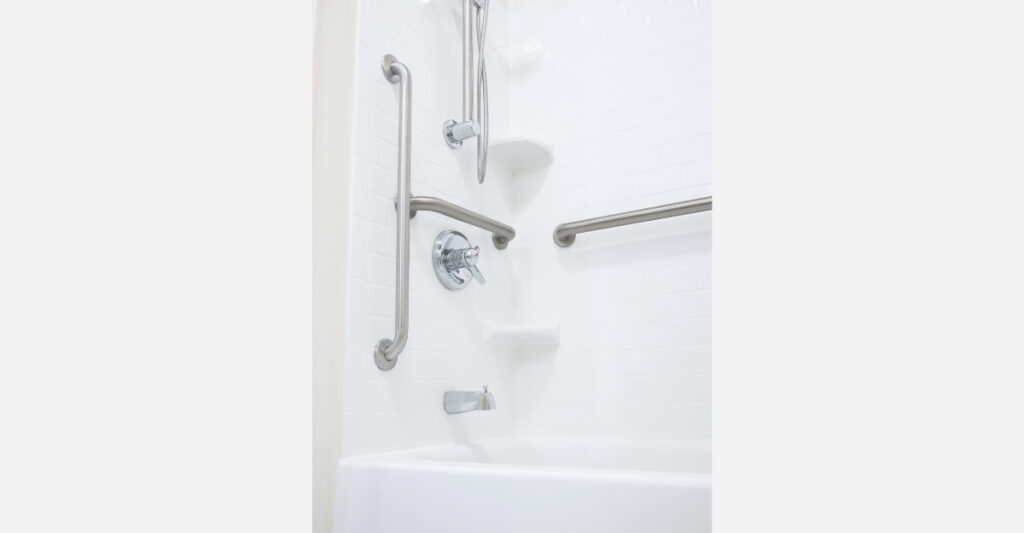 bathtub with multiple grab bars for senior safety